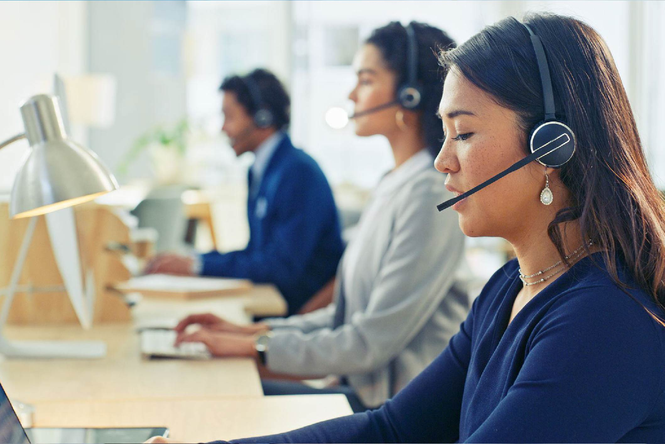 Customer Support Team Working Professionally in a Modern Office Setting